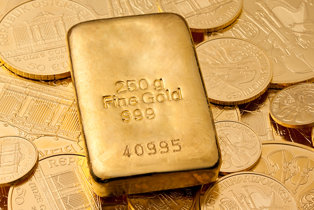 alt="Close-up of purity stamps like 14K and 925 on gold and silver jewelry"